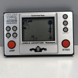 Jungle Adventure Woodman (Crystal Hand Game) Play & Time, mini pocketspel Masudaya